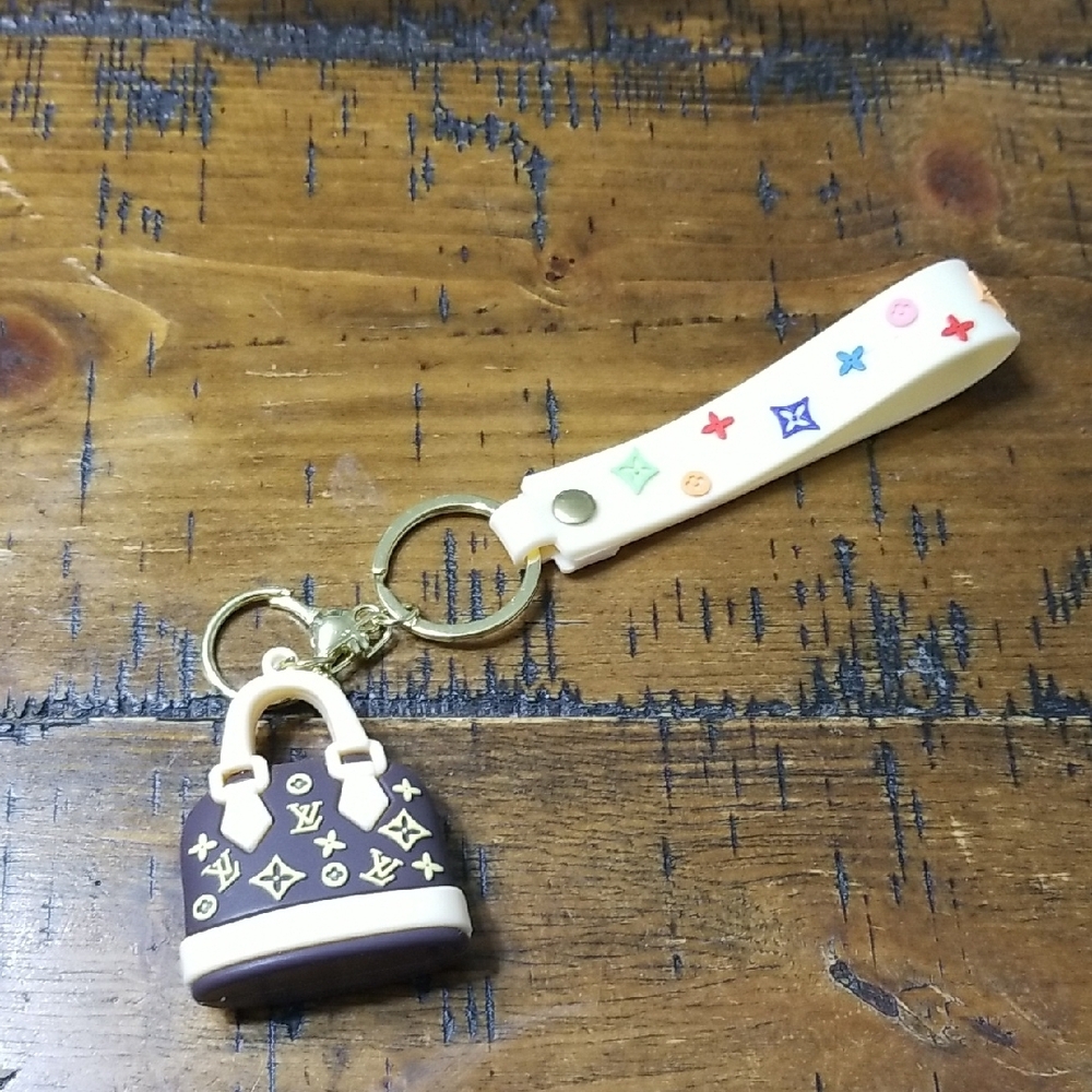 White and Brown Keychain with Multicolor Accents